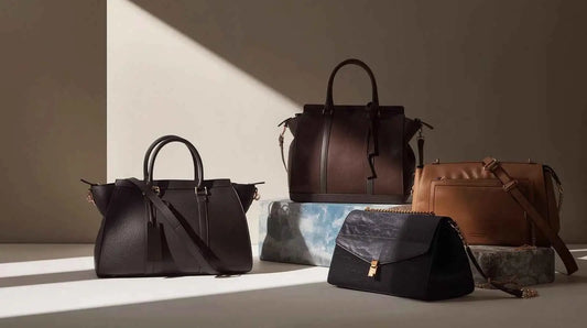 Black leather satchel with structured design in storia delle borse evolution