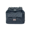 Black Quilted Backpack with Chain Detail - black quilted leather