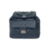 Black Quilted Backpack with Chain Detail - black quilted leather