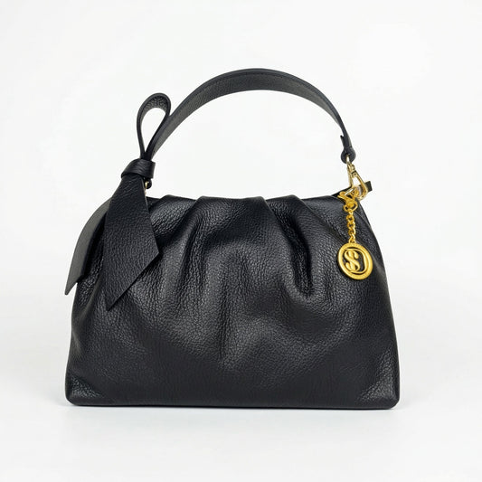 Borsa chic verona in vera pelle nera con charm dorato s e manico con fiocco elegante