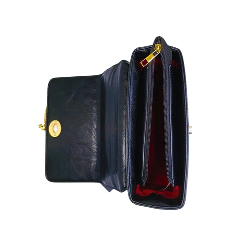 Black leather wallet with gold accents on a white background