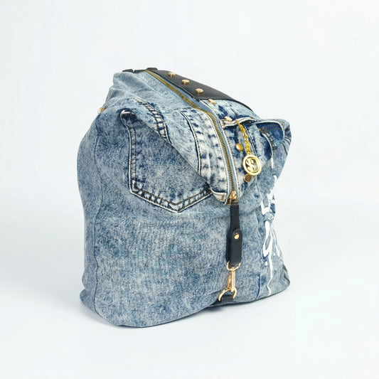 Zaino in denim dask con stampa in denim upcycled blu sbiadito pelle vegana nero e dettagli in oro borsa da donna online